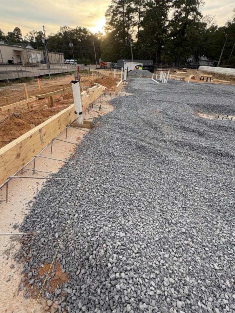 Gravel pad along the forms