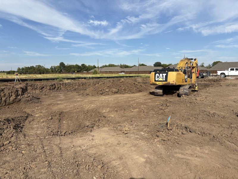 Excavator in a big dig