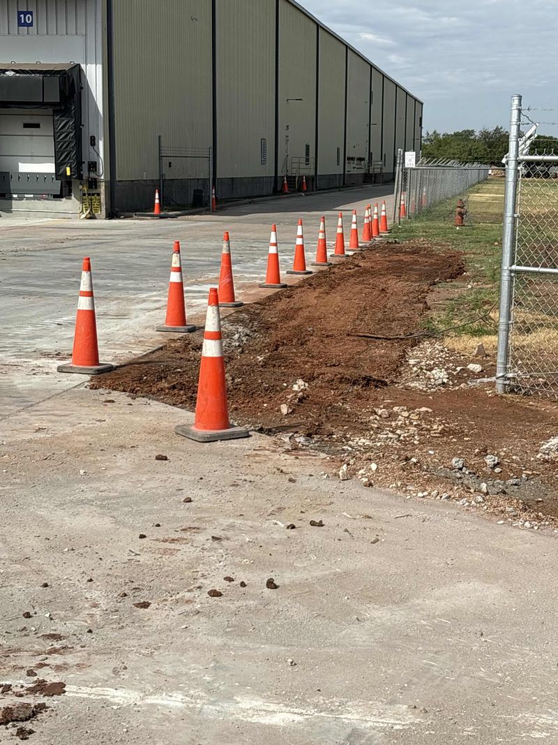 Trenching along a warehouse